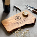 Personalised olive wood Christmas cheese board with engraved snowflake and festive message
